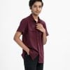Teen boys short-sleeved casual shirt in blended fabric. Classic collar, button fastening at the front and two front pockets.