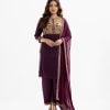 Women's printed straight salwar kameez in joom fabric. Round neck, three-quarter sleeves and karchupi at the front. Paired with a georgette palazzo pant and a chiffon dupatta.