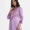 Ladies' printed long-sleeved casual shirt in silk and viscose blended fabric. Stand collar and embroidery at the front.